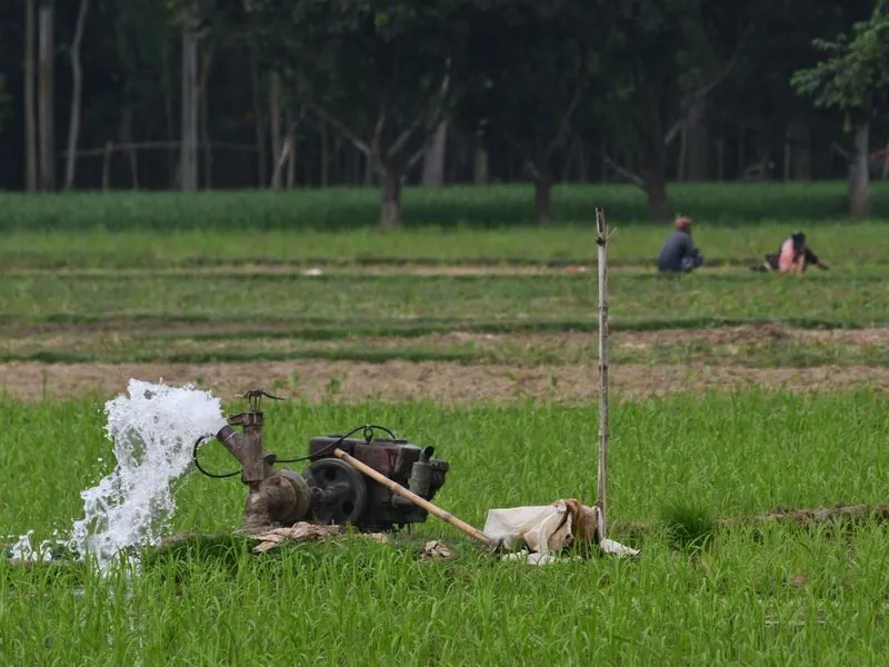 Pump spraying water in a farm field